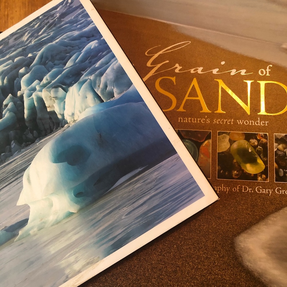 Two hardcover naturalist photography books